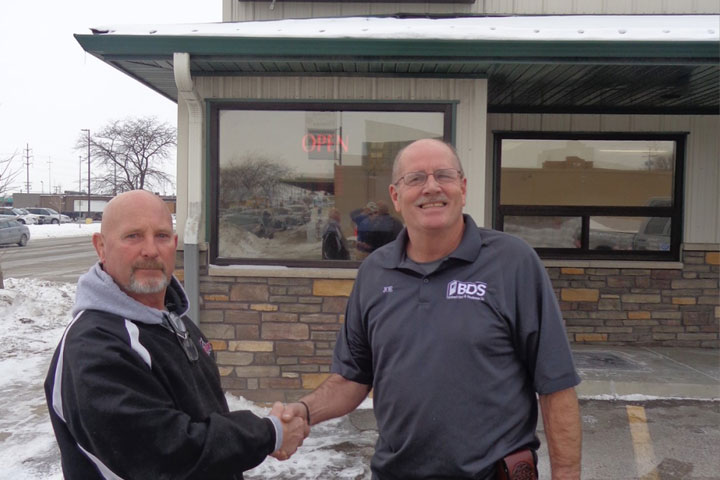 Two men shaking hands